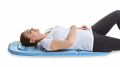 PEMF therapy on the back and hips.